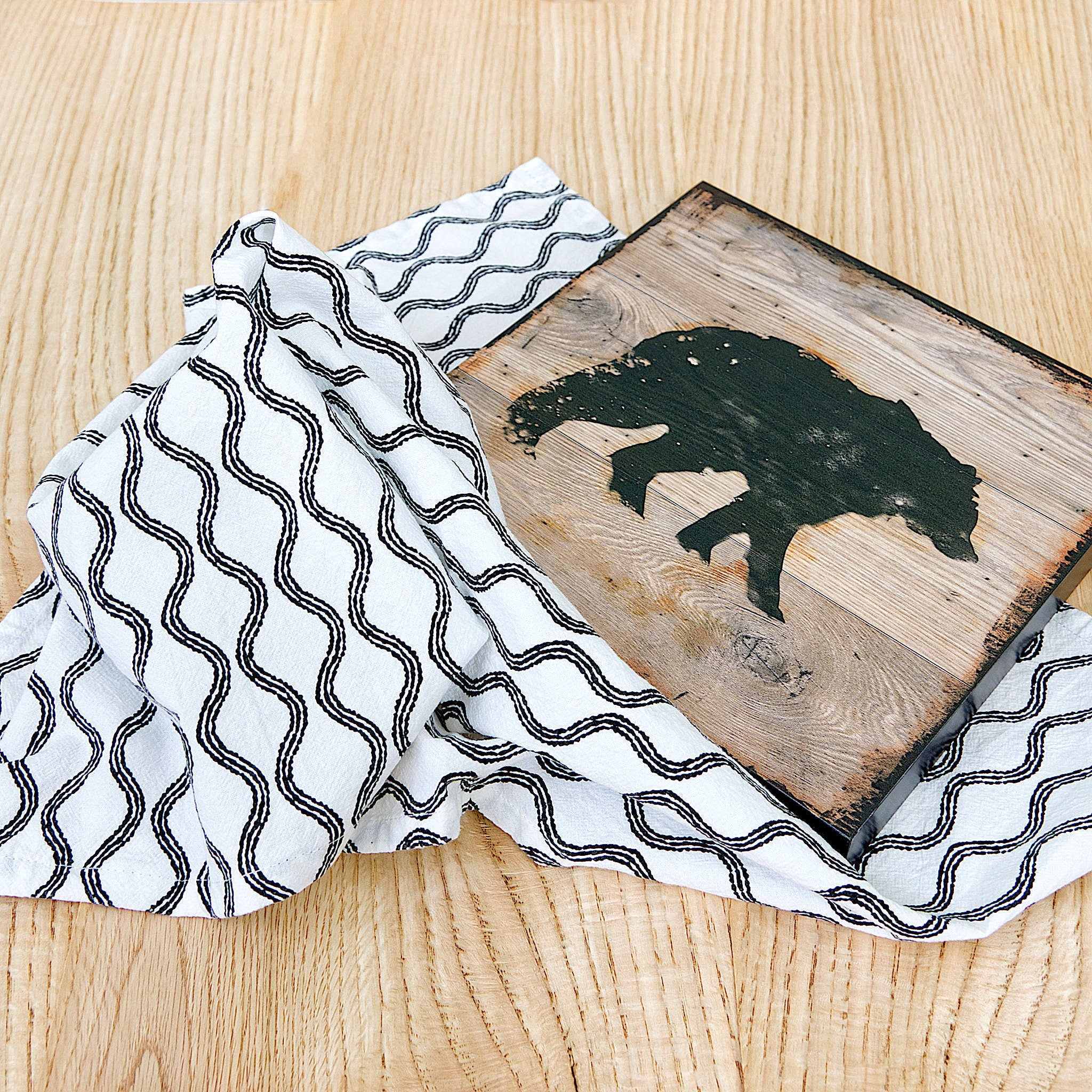 white flour sack towel in steams pattern with bear coaster decoration from Hem And Tassel 