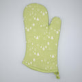cotton oven mitt of tiny countryside design in mint, on a light grey background, from Hem And Tassel 