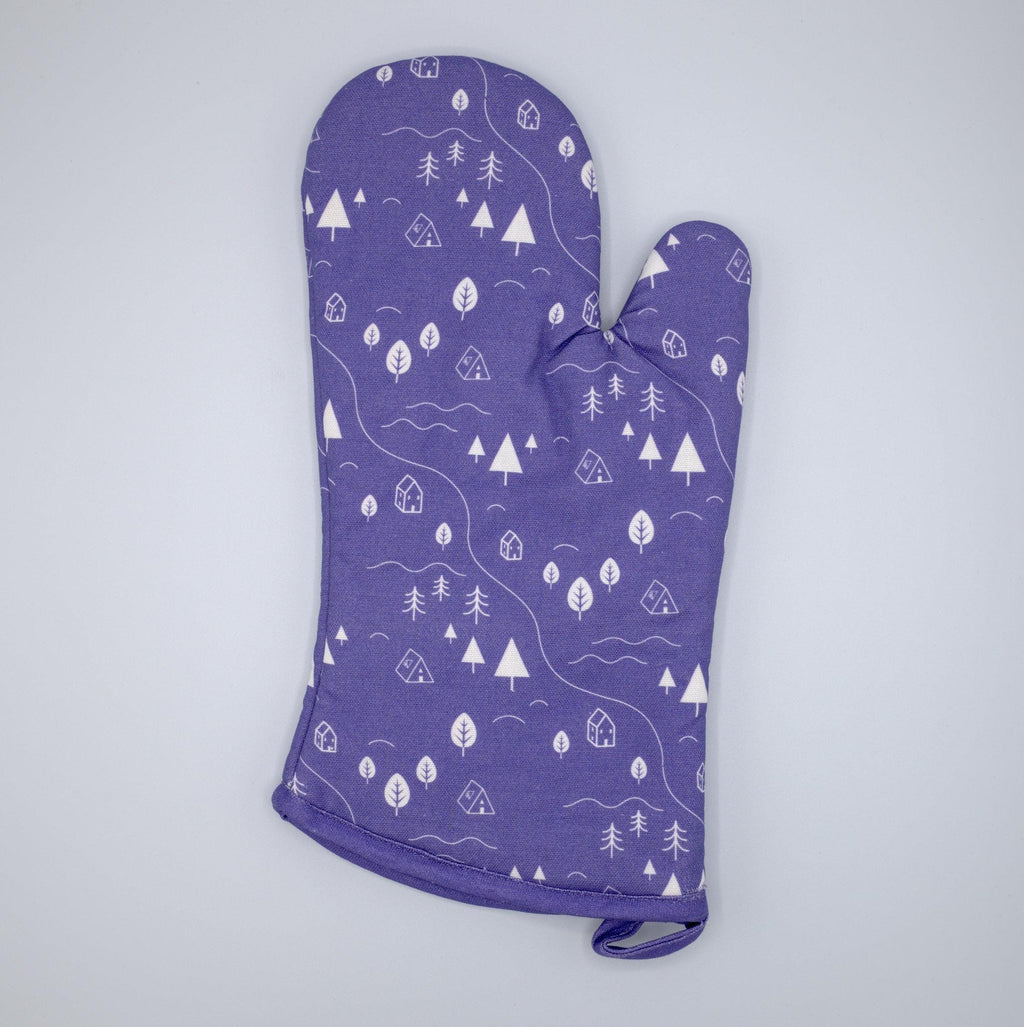 cotton oven mitt of tiny countryside design in purple, on a light grey background, from Hem And Tassel 