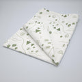 rich cotton percale kitchen towel of tiny countryside design in green color against light grey background- from Hem And Tassel