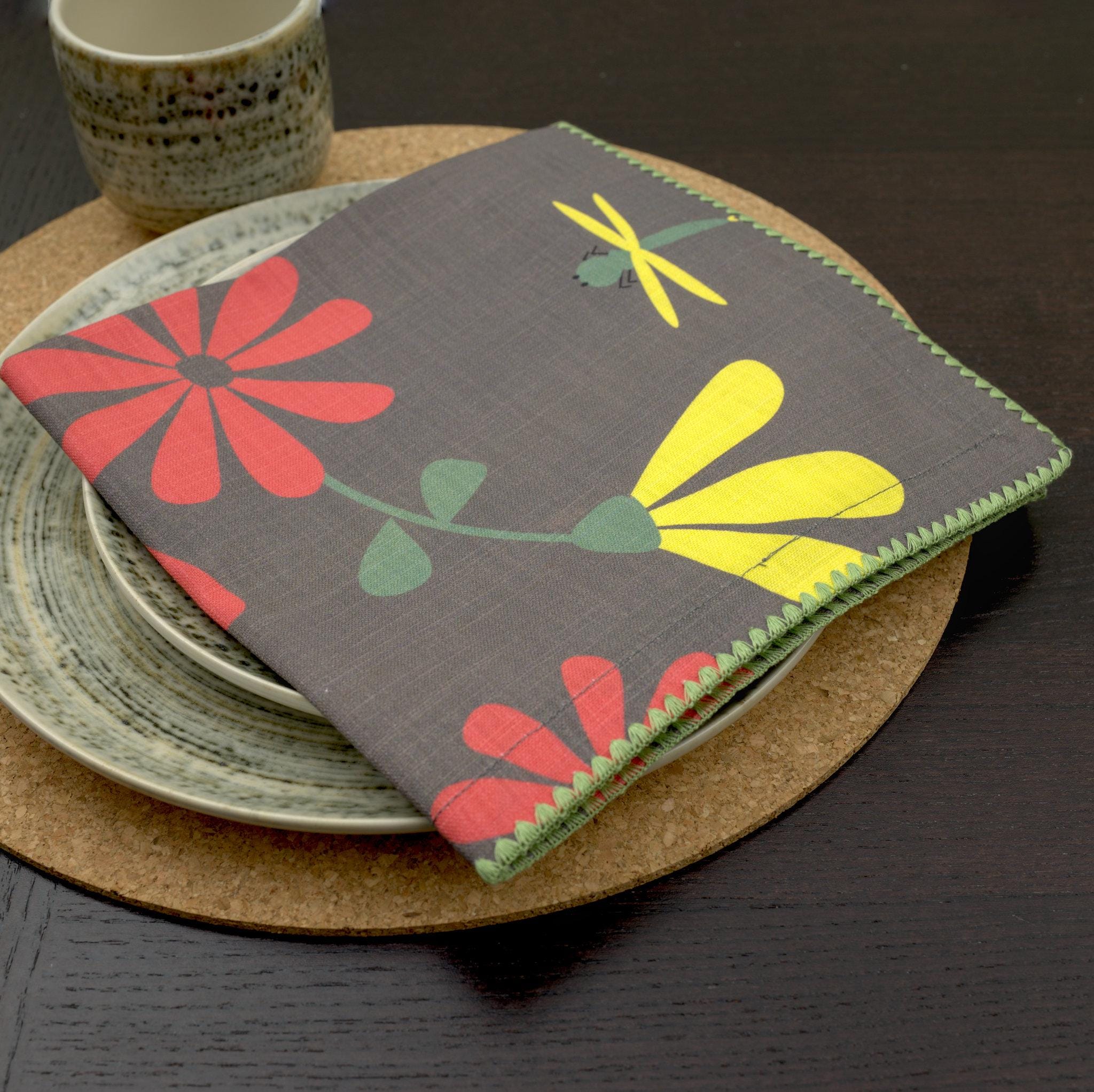slub-cotton dinner napkin of shy dragonfly design in winter brown in dining place setting - from Hem And Tassel
