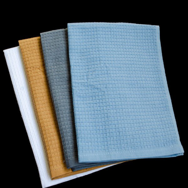 set of 4 cotton reversible towels in white, grey, blue and camel