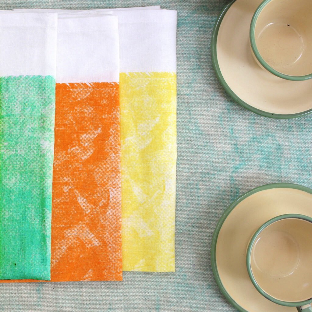 100% Cotton Towels, Colorful Distressed Print, rustic Tie Dye Look, three folded with 2 cups