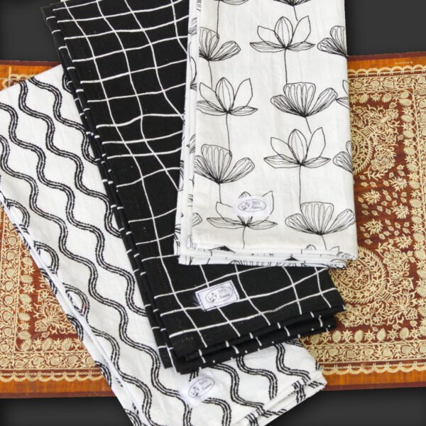 100% Cotton Towels, Crinkled Flour sack, Designer Print, black and white, on a table