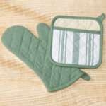 Quilted Decade classic oven mitt and pot holder shown in green color, with pocketed pot holder showing