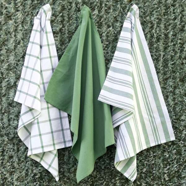 Three large 100% cotton decade classic kitchen towels in flat weave shown hanging