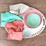 Superfine Breezy Cotton Towels,Yarn Dyed, Showing Assorted, in 3 Dusty Colors shown on a table