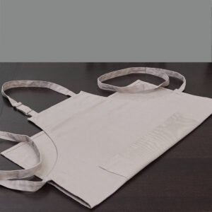 Pro-grade, heavy duty, drill cotton cooking and baking Apron, in in grey with divided pocket and with adjustable neck straps