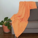 Throw From Europe 100% Cotton Complex Waffle Orange On Sofa