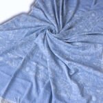 Throw From Europe 100% Cotton Reversible Jacquard Garden pattern Blue Fanned out on Blue side