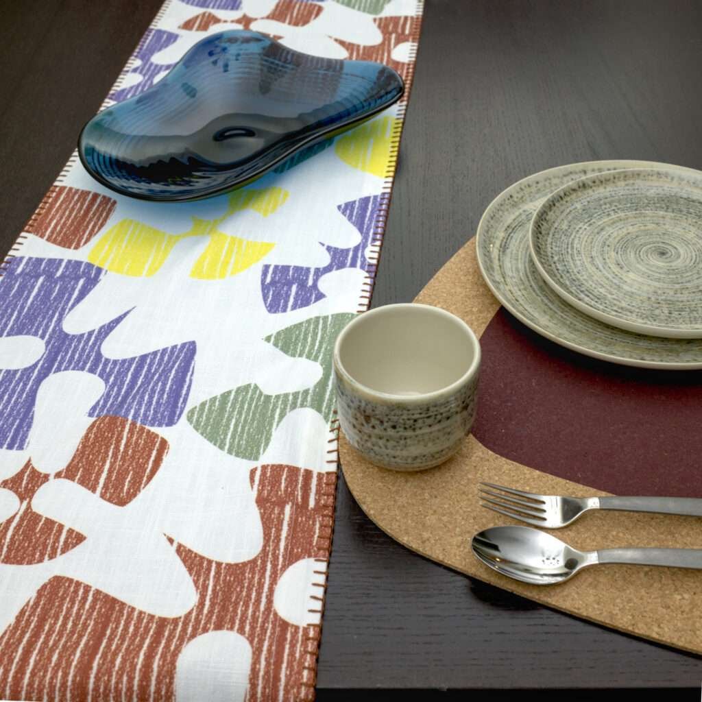 Flock and flutter design Shadow Runner LS with clay kidney bean cork placemat from hem and tassel