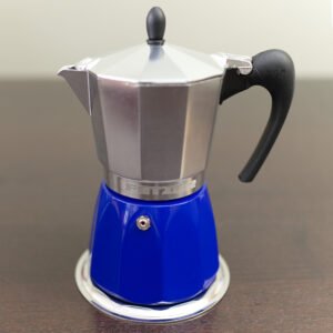 Induction Moka Pot with a blue boiler and lid shut, sitting on a table top