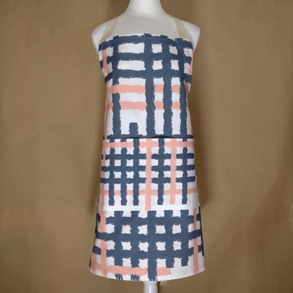 Jute impossible design apron on mannequin from hem and tassel
