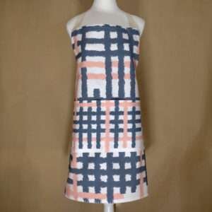 Jute impossible design apron on mannequin from hem and tassel