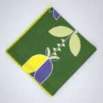 Lip TuLip design dinner napkin in purple flat folded from hem and tassel