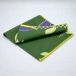 Lip TuLip design dinner napkins in purple folded from hem and tassel