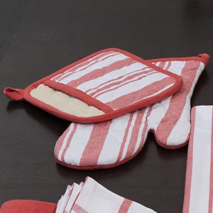 girl in kitchen wearing quilted everyday classic apron in red