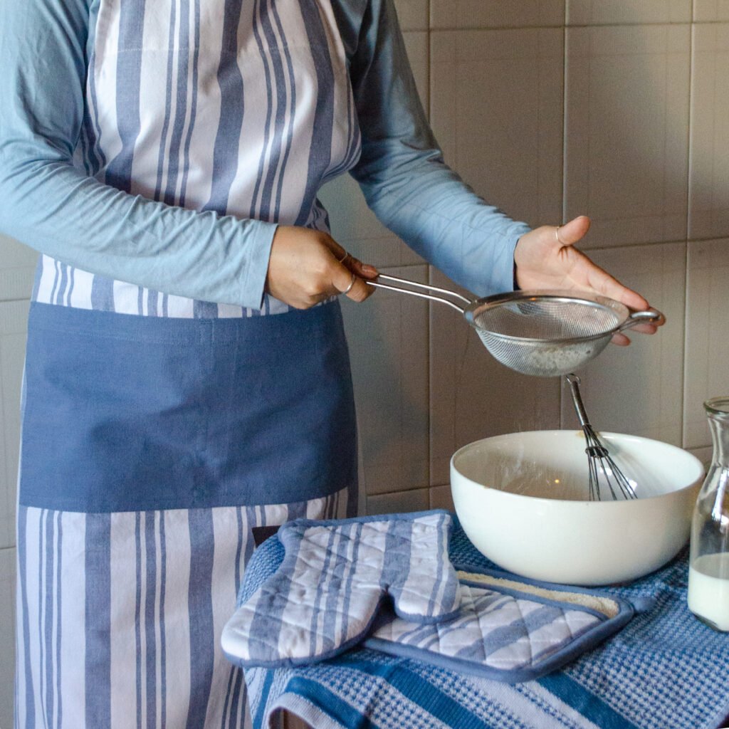 Everyday cooking and baking Apron in Classic blue stripes and solid blue divided pocket with Adjustable neck straps