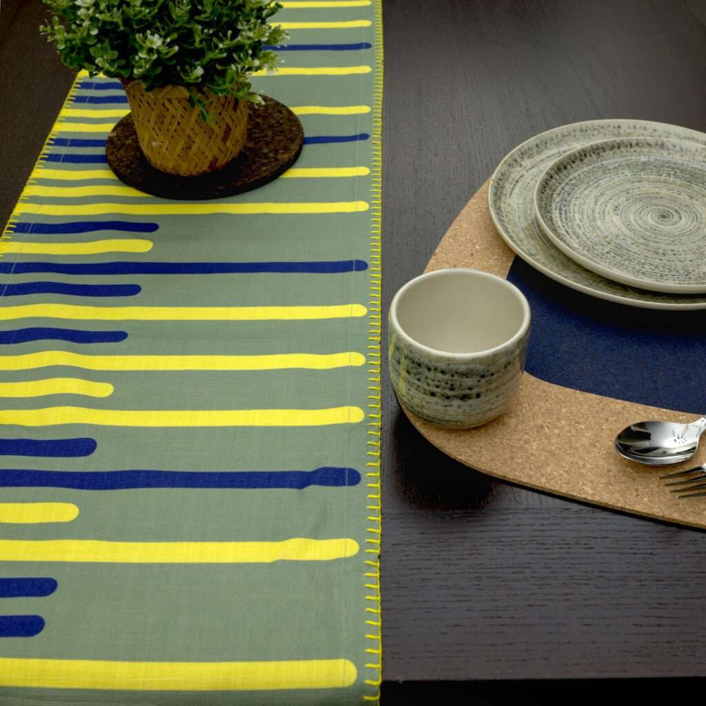 Yellow PIano design Runner LS with blue kidney bean cork placemat from hem and tassel