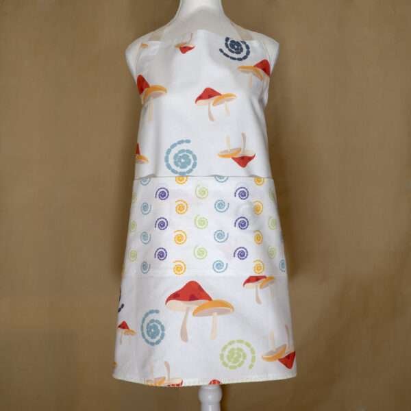 magic mushroom design apron on mannequin from hem and tassel