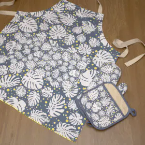 moster-ah design apron in winterf oven mitt and pot holder flat from hem and tassel