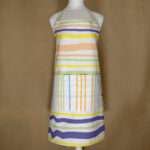 not straight design apron in mild-broad stripes on mannequin from hem and tassel