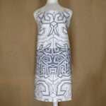 squiggles symmetric design apron in oil on mannequin from hem and tassel