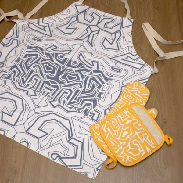 squiggles symmetric design apron in oil with squiggles oven mitt and pot holder flat from hem and tassel