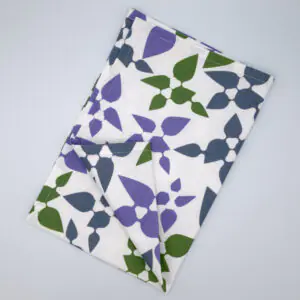 Celebration design tea towel in oil flat folded from hem and tassel
