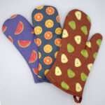 Faded fruit mitts fanned out from hem and tassel