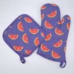 Faded melon design mitt and hot pad in purple from hem and tassel