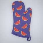 Faded melon design oven mitt from hem and tassel