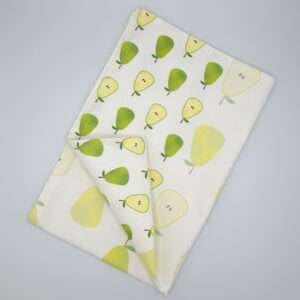 Faded pear design tea towel flat folded from hem and tassel