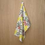 Just leaves design hanging tea towel in yellow oak from hem and tassel