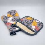 Just leaves design mitt and pocketed hot pad in orange oak from hem and tassel