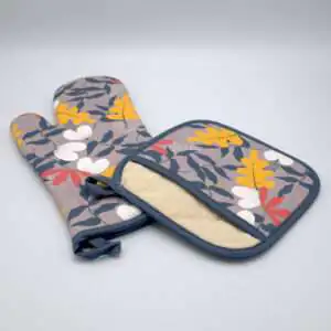 Just leaves design mitt and pocketed hot pad in orange oak from hem and tassel