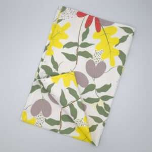 Just leaves design yellow oak tea towel flat folded from hem and tassel