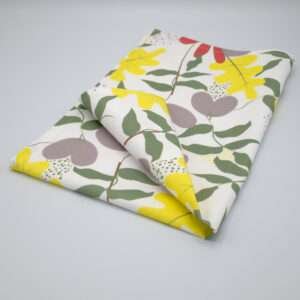 Just leaves design yellow oak tea towel folded from hem and tassel