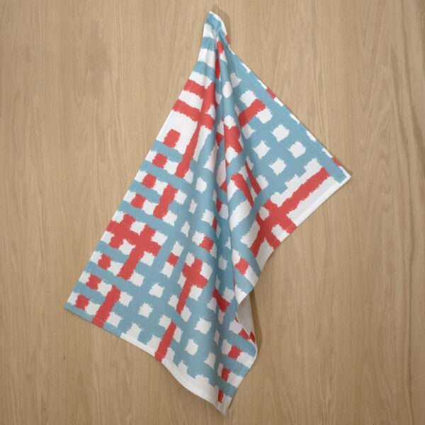 Jute Impossible checked design hanging tea towel in bluye from hem and tassel