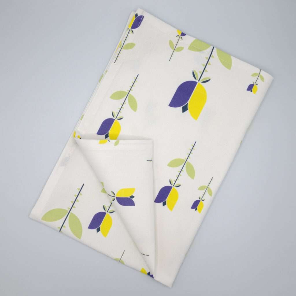 Lip TuLip design purple tea towel flat folded from hem and tassel