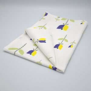 Lip TuLip design purple tea towel folded from hem and tassel