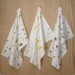 Lip TuLip design three hanging tea towels from hem and tassel