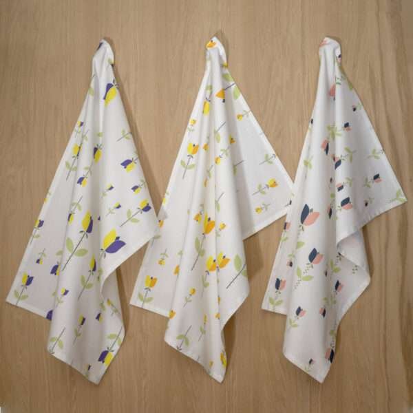 Lip TuLip design three hanging tea towels from hem and tassel
