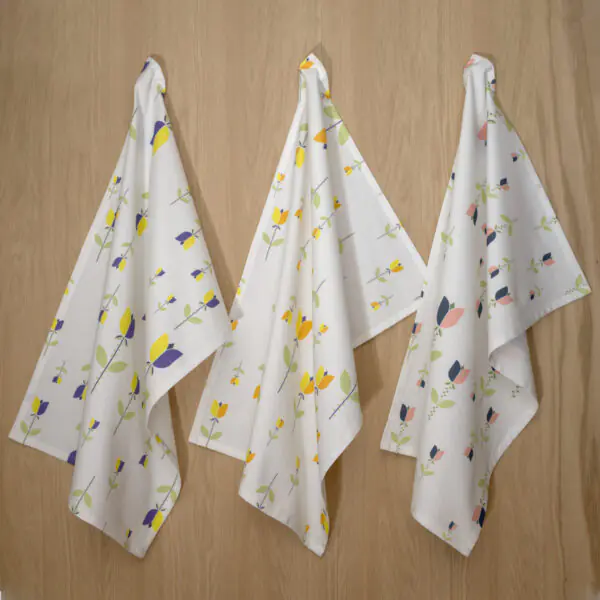 Lip TuLip design three hanging tea towels from hem and tassel