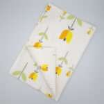 Lip TuLip design orange tea towel flat folded from hem and tassel