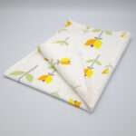 Lip TuLip design orange tea towel folded from hem and tassel