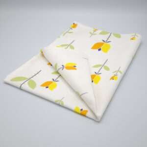 Lip TuLip design orange tea towel folded from hem and tassel