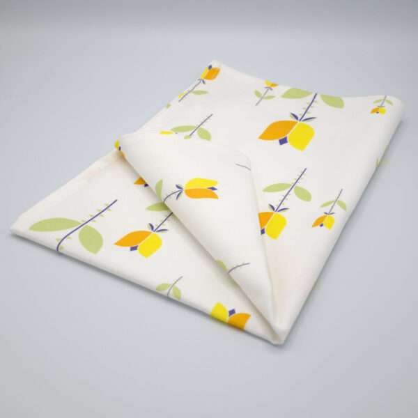 Lip TuLip design orange tea towel folded from hem and tassel