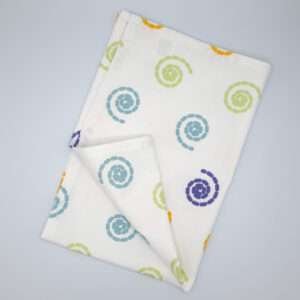Magic design tea towel flat folded from hem and tassel