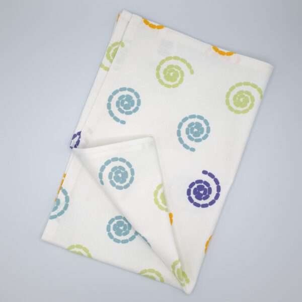 Magic design tea towel flat folded from hem and tassel